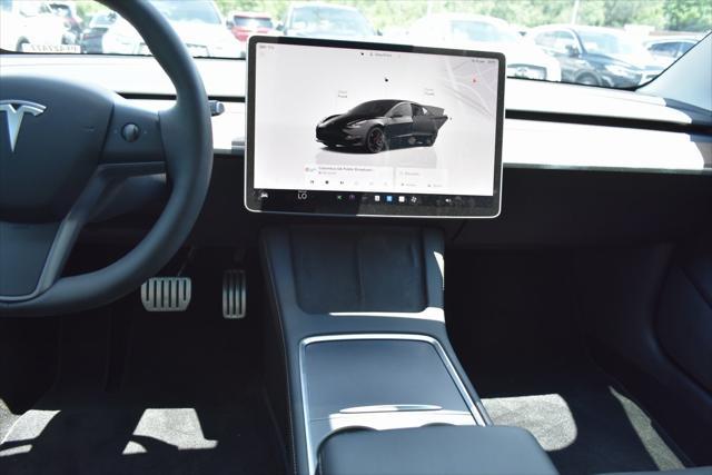used 2023 Tesla Model 3 car, priced at $34,490