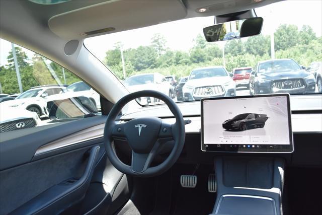 used 2023 Tesla Model 3 car, priced at $34,490