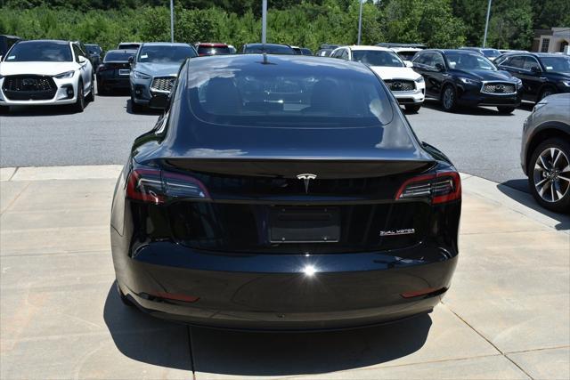 used 2023 Tesla Model 3 car, priced at $34,490