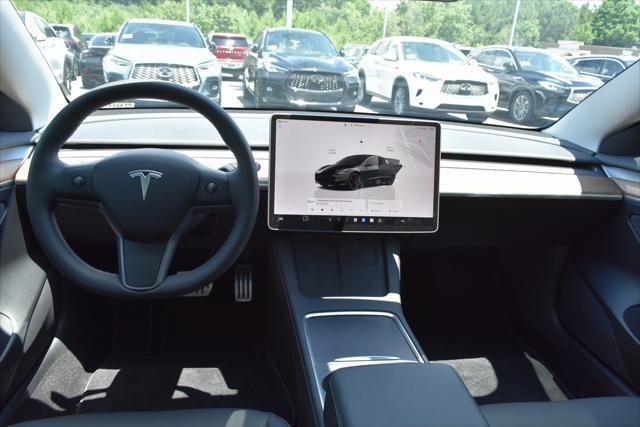 used 2023 Tesla Model 3 car, priced at $34,490