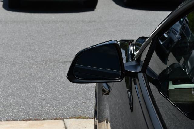 used 2023 Tesla Model 3 car, priced at $34,490