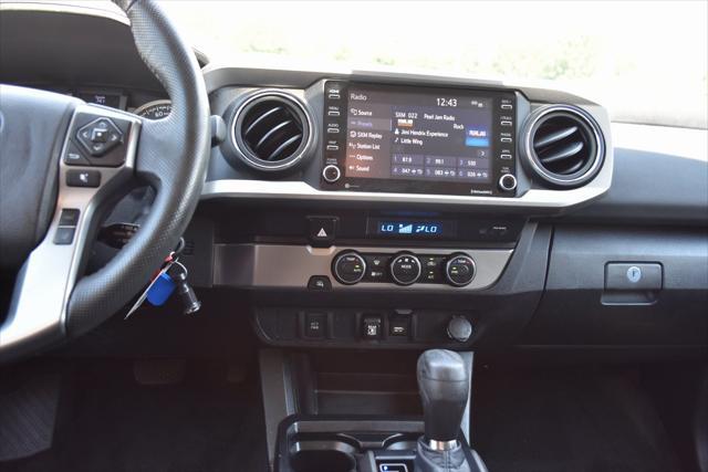 used 2021 Toyota Tacoma car, priced at $25,559