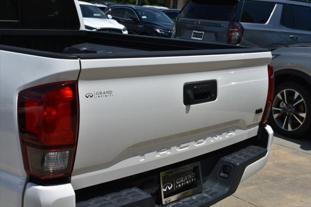 used 2021 Toyota Tacoma car, priced at $25,559