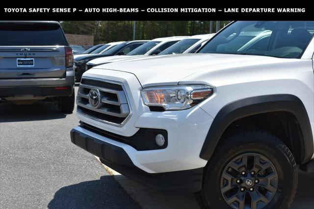 used 2021 Toyota Tacoma car, priced at $25,559
