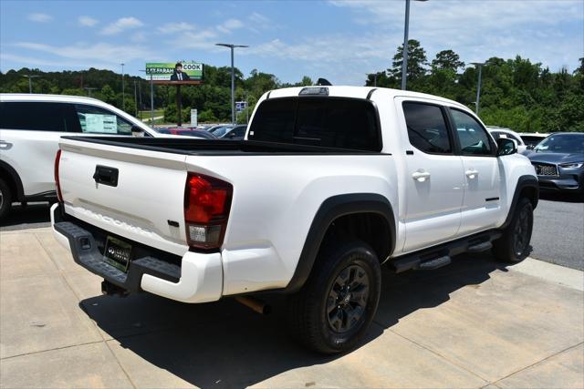 used 2021 Toyota Tacoma car, priced at $25,559