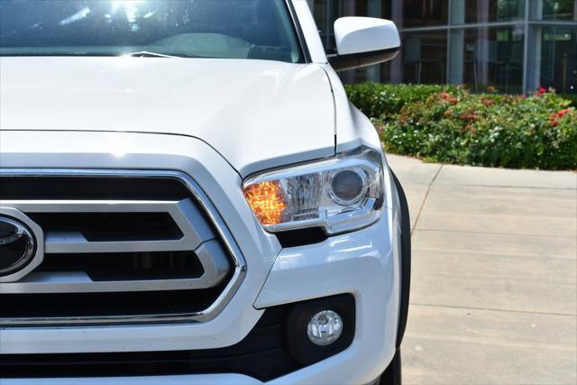 used 2021 Toyota Tacoma car, priced at $25,559