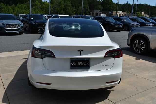used 2023 Tesla Model 3 car, priced at $28,990