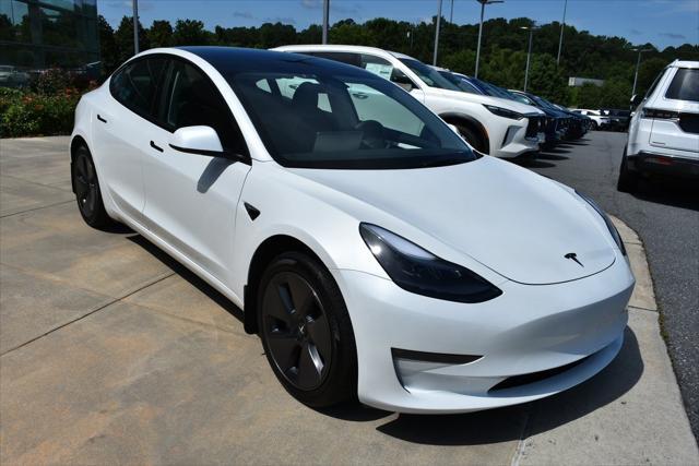 used 2023 Tesla Model 3 car, priced at $28,990