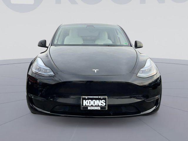 used 2023 Tesla Model Y car, priced at $33,000