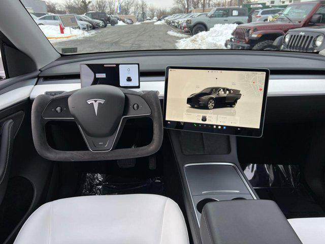 used 2023 Tesla Model Y car, priced at $33,000