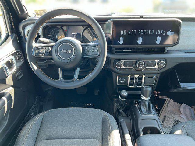 new 2024 Jeep Wrangler 4xe car, priced at $48,077