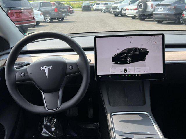 used 2024 Tesla Model Y car, priced at $34,000