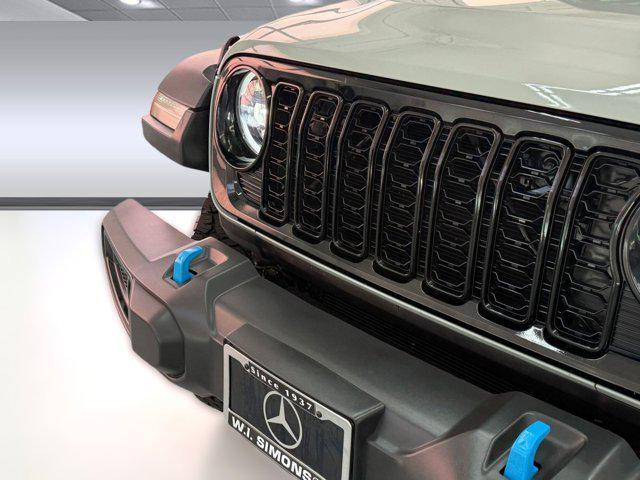 used 2024 Jeep Wrangler 4xe car, priced at $33,699