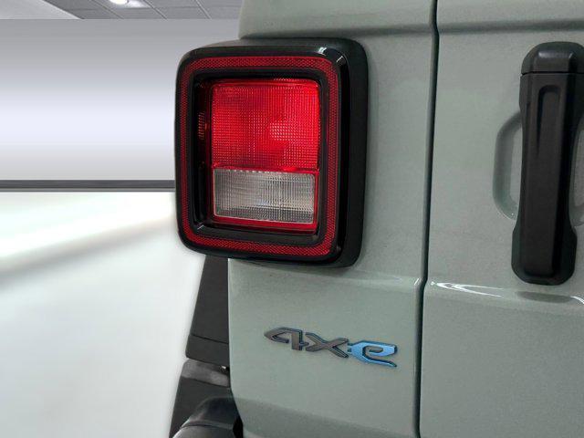 used 2024 Jeep Wrangler 4xe car, priced at $33,699