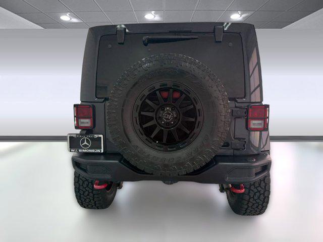 used 2018 Jeep Wrangler JK Unlimited car, priced at $26,888