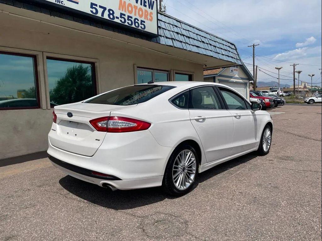 used 2016 Ford Fusion car, priced at $9,995
