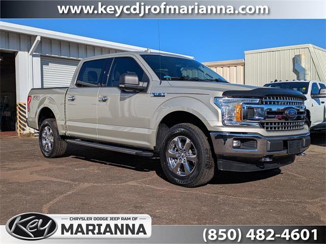 used 2018 Ford F-150 car, priced at $26,411