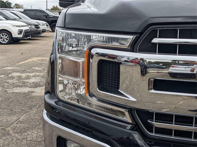 used 2019 Ford F-150 car, priced at $26,411