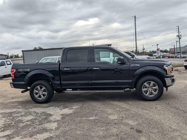 used 2019 Ford F-150 car, priced at $26,411