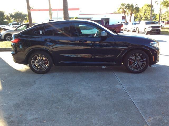 used 2021 BMW X4 car, priced at $38,999