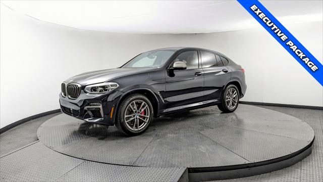 used 2021 BMW X4 car, priced at $38,499