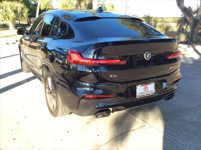 used 2021 BMW X4 car, priced at $38,999