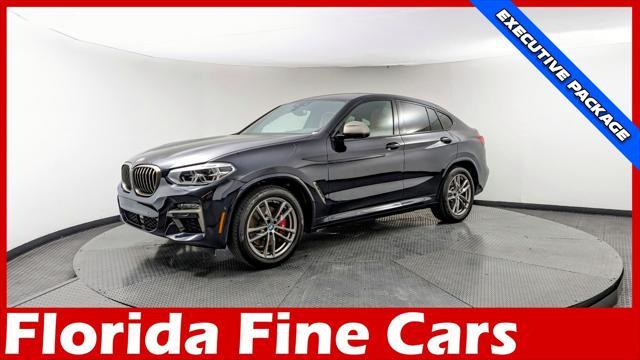 used 2021 BMW X4 car, priced at $38,499