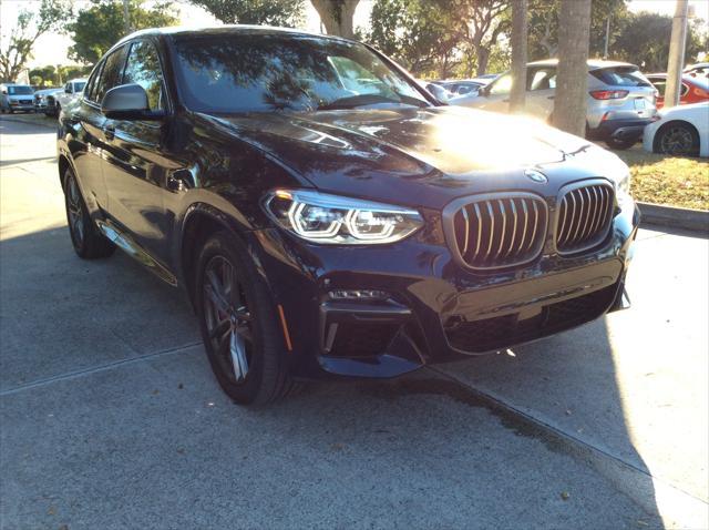 used 2021 BMW X4 car, priced at $38,999