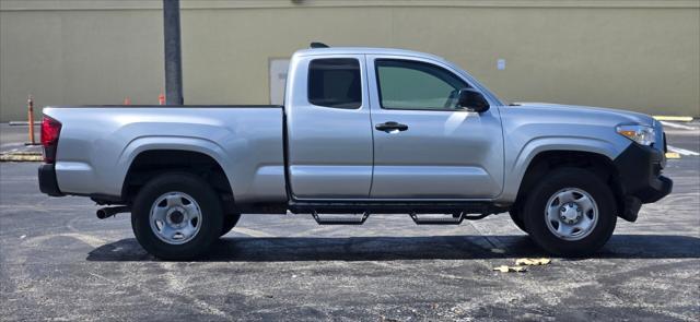 used 2023 Toyota Tacoma car, priced at $24,999