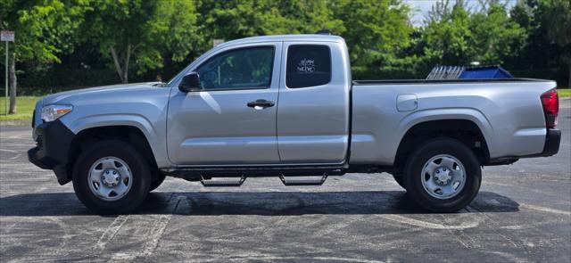 used 2023 Toyota Tacoma car, priced at $24,999