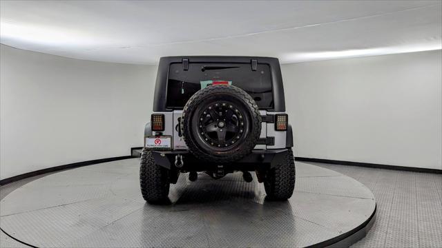 used 2016 Jeep Wrangler Unlimited car, priced at $16,999