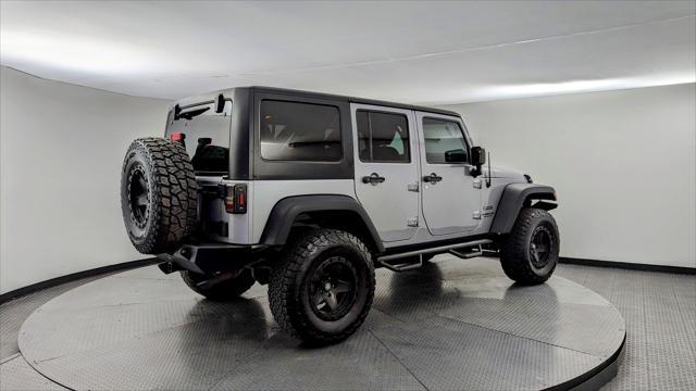 used 2016 Jeep Wrangler Unlimited car, priced at $16,999