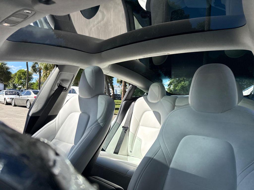 used 2022 Tesla Model 3 car, priced at $21,499