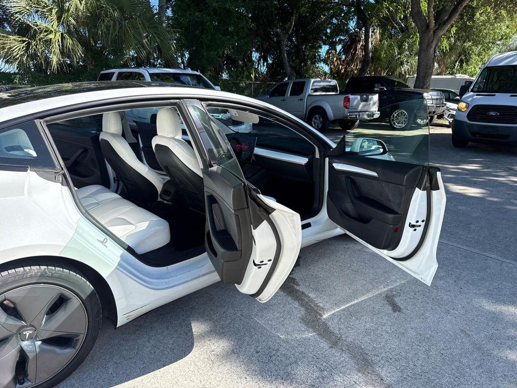 used 2022 Tesla Model 3 car, priced at $21,499