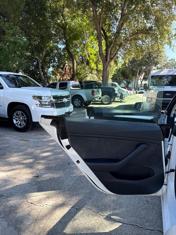 used 2022 Tesla Model 3 car, priced at $21,499