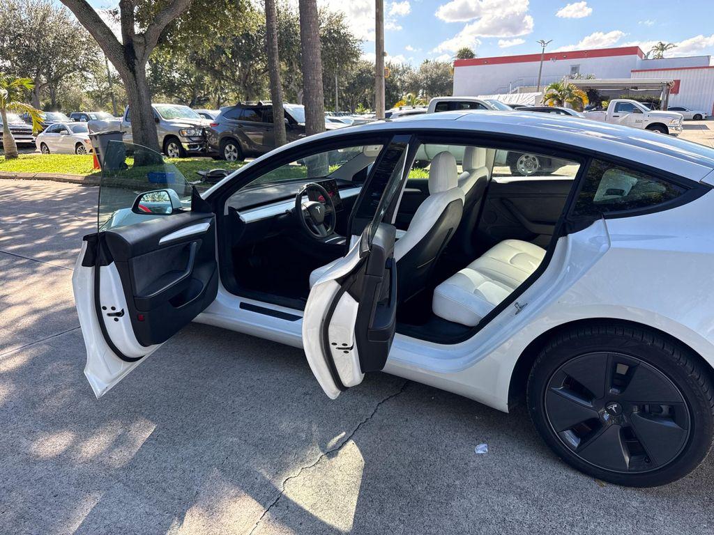 used 2022 Tesla Model 3 car, priced at $21,499