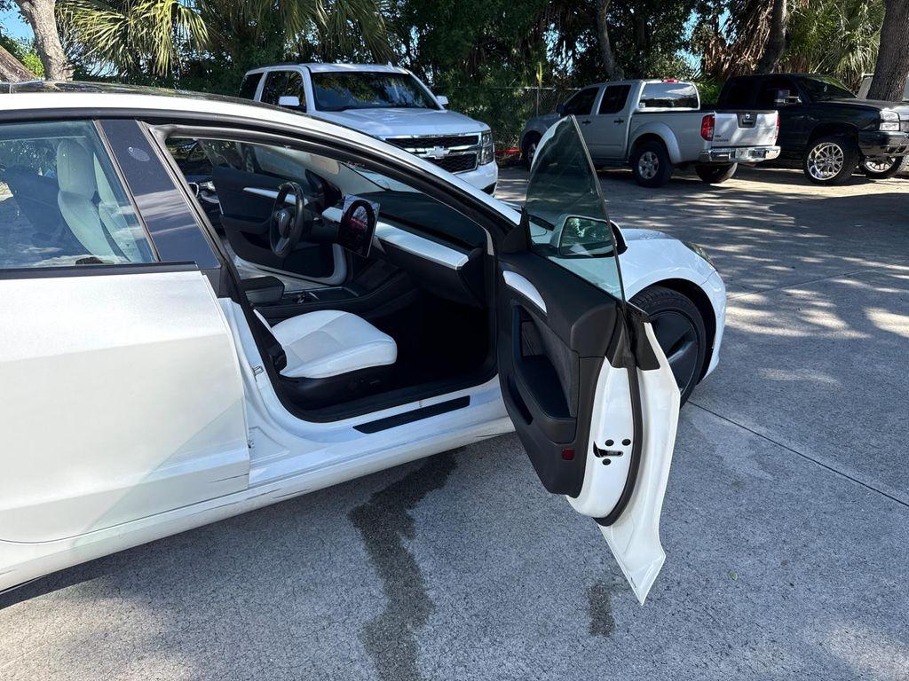 used 2022 Tesla Model 3 car, priced at $21,499