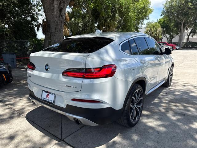used 2021 BMW X4 car, priced at $31,599