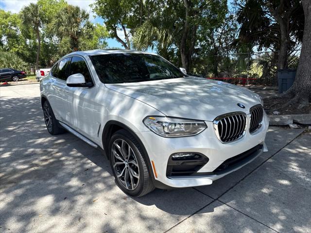 used 2021 BMW X4 car, priced at $31,599