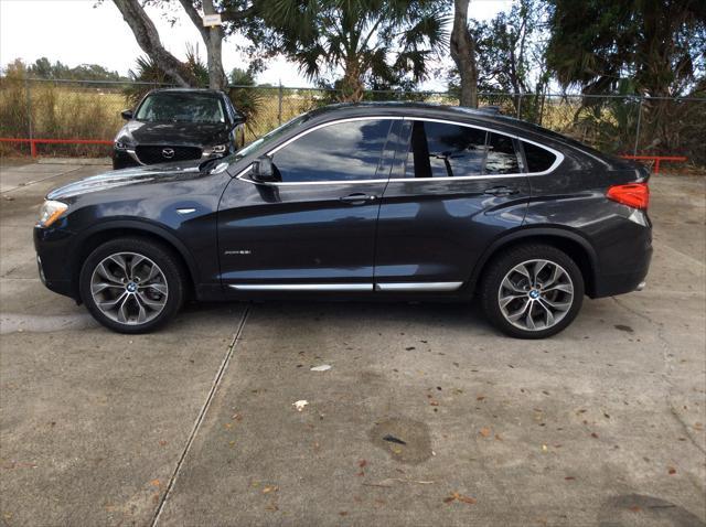 used 2015 BMW X4 car, priced at $12,499