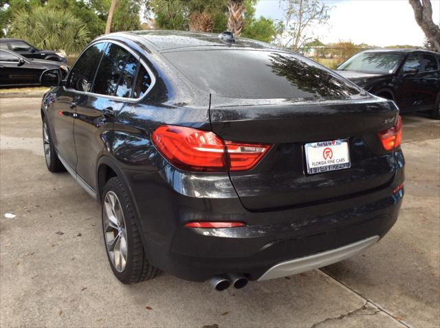 used 2015 BMW X4 car, priced at $12,499