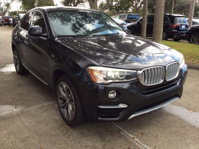 used 2015 BMW X4 car, priced at $12,499