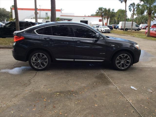 used 2015 BMW X4 car, priced at $12,499