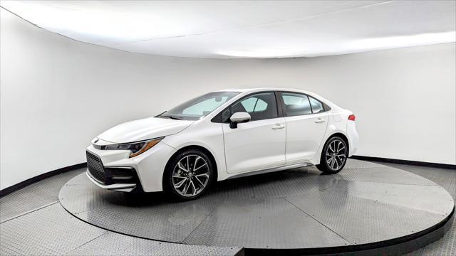 used 2022 Toyota Corolla car, priced at $14,299