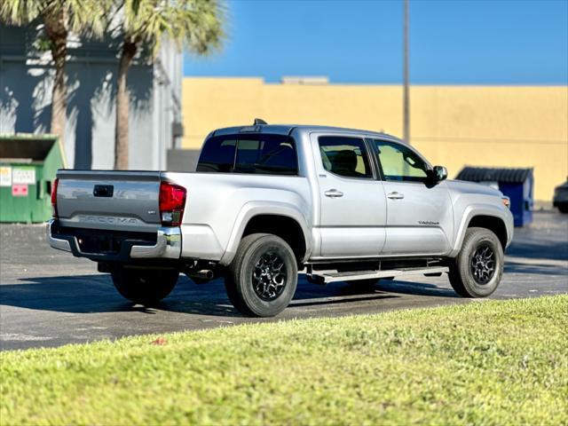 used 2021 Toyota Tacoma car, priced at $25,997