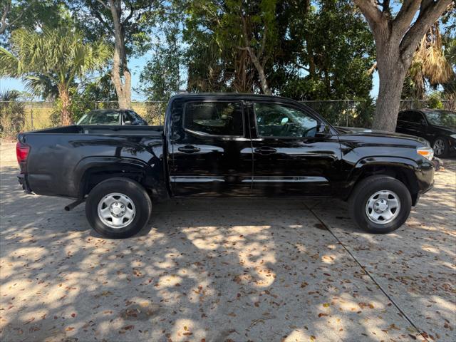 used 2023 Toyota Tacoma car, priced at $25,699