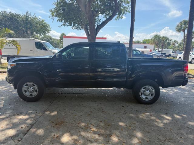used 2023 Toyota Tacoma car, priced at $25,699