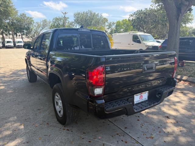 used 2023 Toyota Tacoma car, priced at $25,699
