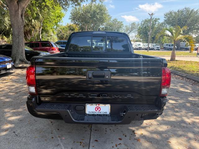 used 2023 Toyota Tacoma car, priced at $25,699