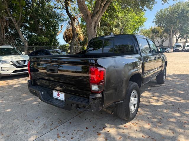 used 2023 Toyota Tacoma car, priced at $25,699